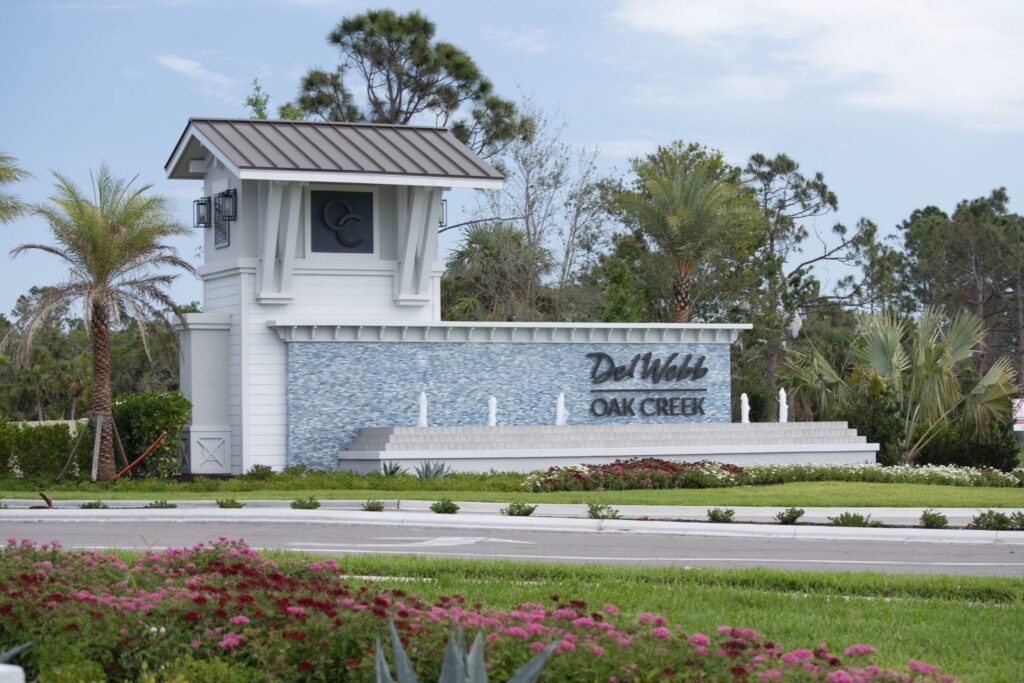 Entrance monument and gatehouse at Del Webb Oak Creek, North Fort Myers, FL
